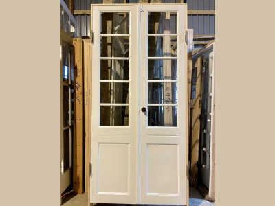 Smal og høj dobbelt glasdør m. trukket glas